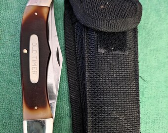 Schrade Old Timers No.250T  2-blade knife with Delrin handle and canvas  sheath. The knife is made the USA.