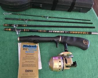 antique green collapsimg fishing pole Zebco Telescopic Vintage 5' Lite Weight Backpack Travel Fishing Rod Model  4293. the Zebco Fishing Rod is Made in Korea