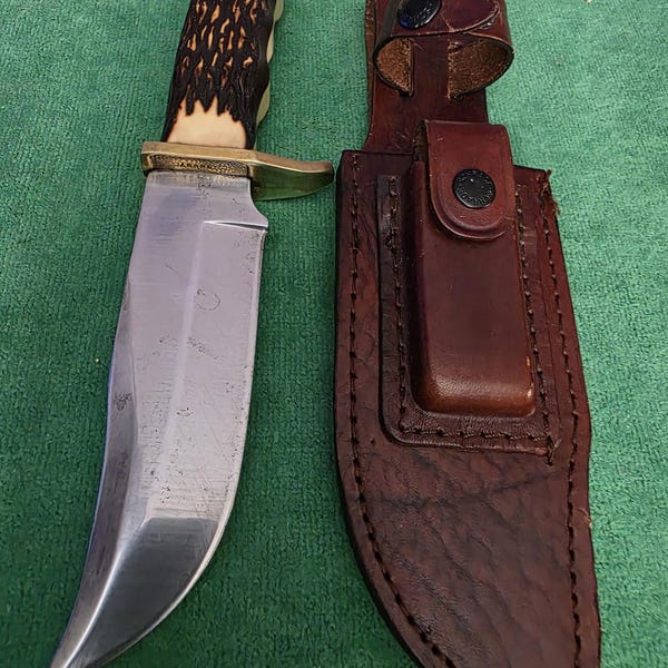 Schrade collectors 1970's No.171UH hunting knife 5-1/2", bone style handle, sharpening sanding stone & leather sheath. The knife's #35597.