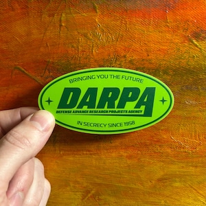 DARPA vinylklistermärke för laptop | Försvarsmyndighetens UFO-konst för utomjordingar