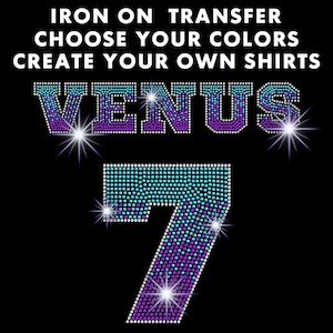 May include: Iron-on transfer design featuring the word "VENUS" and the number "7" in rhinestones. The design is in shades of blue, purple, and white.