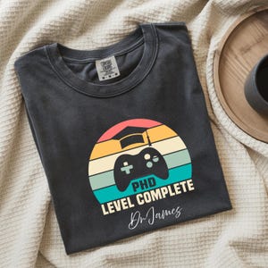 Personalized T-shirt - PhD Completed - Retro Gamer Video Game Console Design - Original Unisex Graduation Gift - Fun Graduation Idea