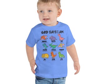 Camiseta "Dios dice que soy un niño pequeño", camiseta para niño con fe, camiseta de dinosaurio para niño, camiseta de dinosaurio con versículo bíblico, camiseta de dinosaurio, camiseta de fe, camiseta para niño