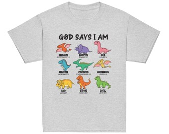 Camiseta "Dios dice que soy joven", camiseta para niño con fe, camiseta de dinosaurio, camiseta de dinosaurio con versículo bíblico, camiseta de dinosaurio, camiseta de fe, camiseta para niño