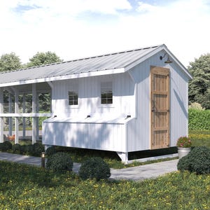 May include: A white chicken coop with a metal roof and a wooden door. The coop has a covered run with wire mesh sides. The structure is set on a grassy area with a stone walkway and landscaping.