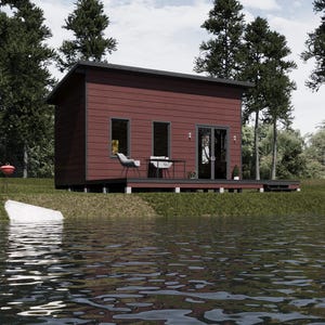 May include: A modern, red cabin with a small deck, two chairs, and a table sits near a lake. The cabin has two windows and a glass door. Tall trees surround the cabin, and a red grill is on the grass.