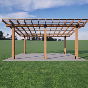 May include: A wooden pergola with a grid roof, supported by four vertical posts. The structure is set on a concrete pad, surrounded by green grass and a blue sky.