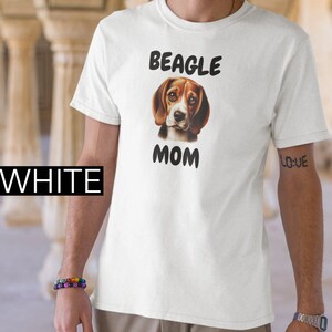 Unisex Softstyle T-Shirt. Beagle dog, Dog lover, Pet parent, Hound companion, Beagle breed, Dog mom, Animal affection, Paw print design