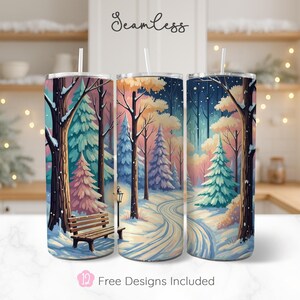 May include: Three 20 oz. stainless steel tumblers with a winter forest scene. The design features a snowy path, trees, and a bench. The tumblers have white straws and the text "Seamless" and "Free Designs Included".