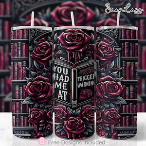 May include: A sublimation design featuring a book with the text "You Had Me At" and "Trigger Warning" on a bookshelf with red roses. The design is meant to be used on a tumbler.