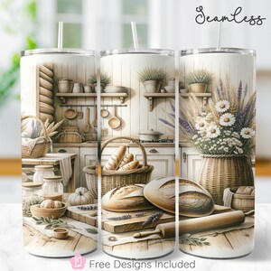 May include: A set of three stainless steel tumblers with a seamless design featuring a rustic kitchen scene. The design includes bread, baskets, and flowers. The tumblers have white straws and the text "Seamless" and "12 Free Designs Included".