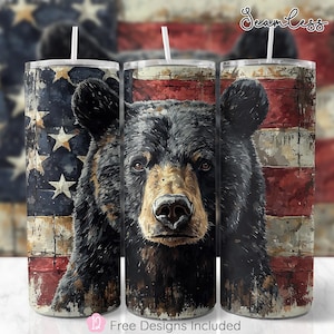May include: Three sublimation tumbler designs featuring a black bear with a distressed American flag background. The bear's face is centered in each design. The text "Seamless" is visible in the top right corner of the image.