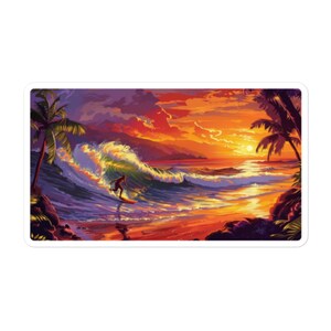 May include: A surfer rides a wave at sunset with palm trees in the background. The sky is a vibrant orange and pink, and the water is a deep blue.