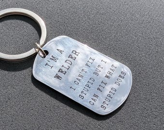 I'm a welder, I can't fix stupid but I can fix what stupid does - Personalised stamped effect font stainless keyring / Keychain