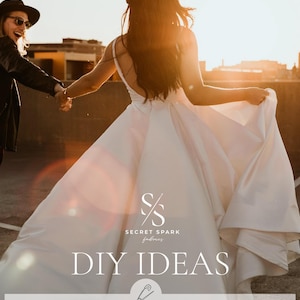 May include: A bride in a white wedding dress walks with her partner on a rooftop. The text "Royal" Mikado stretch satin is a luxurious fabric with an elite granular texture. With its rich matte noble sheen, it's just perfect for dresses of this kind." is displayed below the image. The text "SECRET SPARK fabrics" is displayed above the text "DIY IDEAS".