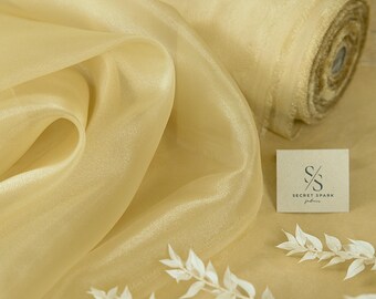 Light Gold Crystal Organza Fabric by the Yard, Ships from California Sheer Fabric for Wedding Gown, Apparel, Decor, Chair Sashes | Glimmer