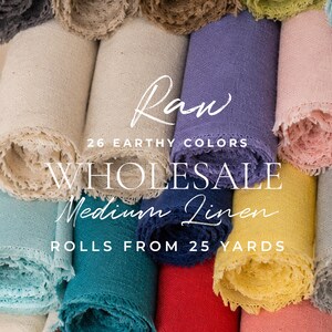 May include: Multiple rolls of medium weight linen fabric in various colors including charcoal, beige, purple, yellow, red, and teal. The text reads: SECRET SPARK fabrics, Raw, 26 EARTHY COLORS, WHOLESALE Medium Linen, ROLLS FROM 25 YARDS, and SS logo.