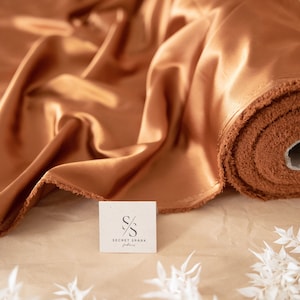 Cinnamon Stick Soft Silky Satin Quality Fabric,  1 Way Stretch  Satin Perfect for Pillows, Sheets, Ladies Clothing, As Evening Wear | Iconic
