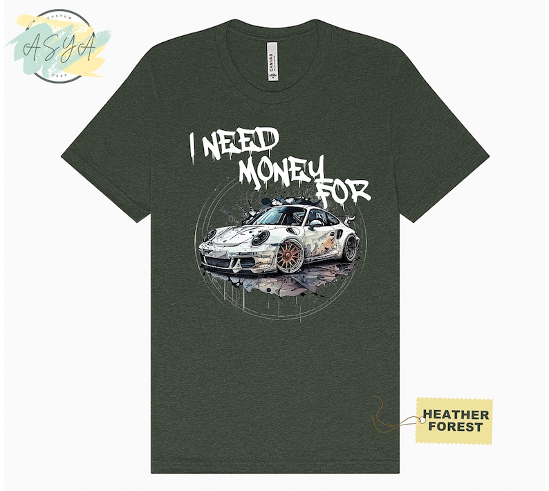 May include: A green t-shirt featuring a white sports car graphic and the text "I NEED MONEY FOR" in white graffiti-style lettering.