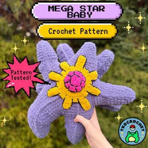 May include: A crocheted plush toy in the shape of a star, primarily lavender with a yellow and pink center. The text "MEGA STAR BABY" and "Crochet Pattern" are displayed. A pink starburst reads "Pattern Tested!"