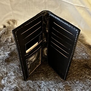 Cartera larga cosida a mano
