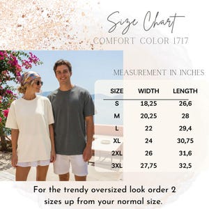 May include: A size chart for Comfort Color 1717 t-shirts, displaying width and length measurements in inches for sizes S through 3XL. The chart includes a photograph of two individuals wearing short-sleeved t-shirts in cream and dark gray.