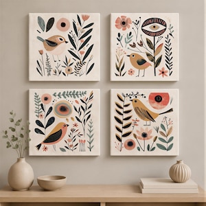 four square wall art pieces with various floral and bird designs, displayed on a wall above a wooden shelf with decorative items.