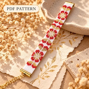 May include: A beaded bracelet featuring a repeating floral pattern in red, white, and gold beads. The bracelet has gold-toned metal end caps and a gold chain extender. The image includes the text PDF PATTERN in the upper left corner.