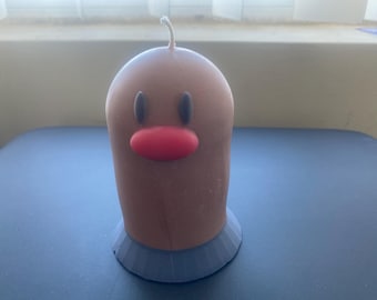 Diglett-kaars: gaat lang mee