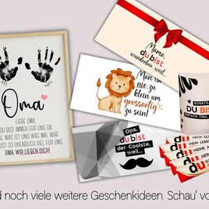 May include: A collection of gift items, including a framed print with handprints and text, cards with illustrations and messages, and a cylindrical container. The items feature German text and are suitable for various occasions.