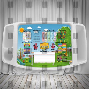 May include: A white plastic tray with a colorful educational design for children. The design includes the alphabet, numbers, pre-k words, patterns, shapes, and colors. The tray has handles and a built-in cup holder.