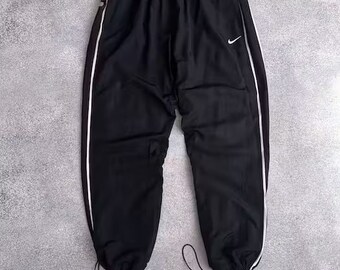 VTG Nike Nylon Y2K Pantalones de pista de perforación