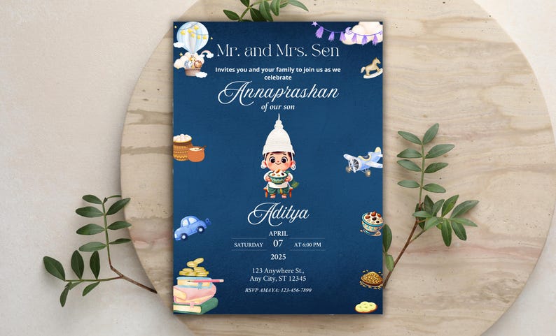 May include: A dark blue rectangular invitation card featuring a central illustration of a child in a traditional white cap holding a bowl. The text reads Mr. and Mrs. Sen invite you to celebrate the Annaprashan of our son Aditya on April 7, 2025.