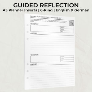 Op de afbeelding: Witte A5 planner inserts met de tekst "GUIDED REFLECTION" en "REFLECTION QUESTIONS - ANSWER SHEET". De inserts zijn ontworpen voor een 6-rings binder en bevatten ruimte voor vragen, antwoorden en categorie details.