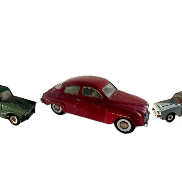 Tekno denmark saab 96 827 plus two other Vintage Model Cars