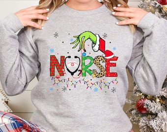 Grinch Nurse Sweatshirt, Christmas Nurse Hoodie, Nurse Grinch Claus Sweatshirt, Merry Grinchmas Hoodie, Nursing Christmas Crewneck 193770