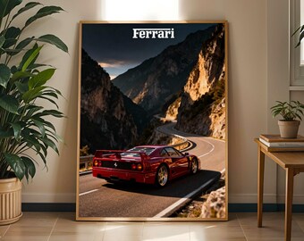 May include: A framed print featuring a red Ferrari sports car driving on a winding mountain road. The image has a cinematic quality, with the word "Ferrari" displayed at the top. The car is the focal point, set against a backdrop of rugged mountains and a dramatic sky.