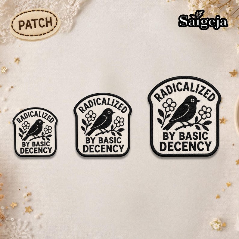May include: Three black and white patches with the text "RADICALIZED BY BASIC DECENCY" and a bird perched on a branch with flowers. The patches are in different sizes and shapes.