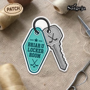 May include: Embroidered patch set featuring a teal locker room tag and a grey key, both with hockey stick graphics. The tag reads "BRIAR U LOCKER ROOM". The patches are set against a neutral fabric background.