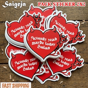 May include: A pack of red heart-shaped stickers with white borders. Each sticker features the text "Actually yeah maybe today Satan" in white, along with a cartoon devil illustration. The stickers are 2x2 inches.