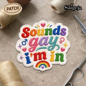 May include: Embroidered patch with the text "Sounds gay I'm in" in rainbow colors. The patch features hearts, stars, and gender symbols. The patch is white with a scalloped edge.