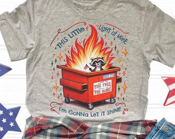 Dumpster Fire 4th of July Raccoon T-Shirt: This Little Light of Mine Graphic Tee