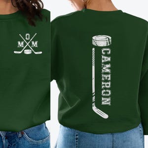 Hockey Mom Personalized Sweatshirt, Custom Name or Number, Mom with Hockey sticks and Puck on Front, Number, Name and Hockey stick on Back