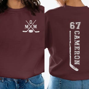 Hockey Mom Personalized Sweatshirt, Custom Name or Number, Mom with Hockey sticks and Puck on Front, Number, Name and Hockey stick on Back