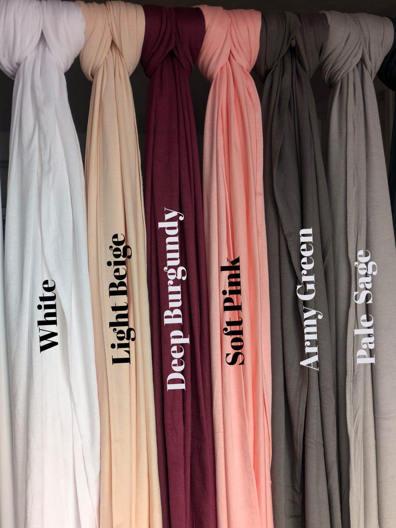 Jersey hijab for women, Muslim headscarf, soft stretchy hijab for daily wear

Plain jersey hijab, breathable modest head wrap, perfect for work or prayer

Non-slip stretch jersey hijab, easy to style Muslim head covering

Everyday jersey hijab, comfortable and elegant modest fashion accessory