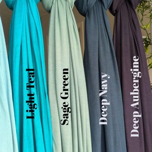 Jersey hijab for women, Muslim headscarf, soft stretchy hijab for daily wear

Plain jersey hijab, breathable modest head wrap, perfect for work or prayer

Non-slip stretch jersey hijab, easy to style Muslim head covering

Everyday jersey hijab, comfortable and elegant modest fashion accessory