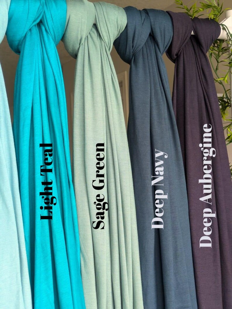 Jersey hijab for women, Muslim headscarf, soft stretchy hijab for daily wear

Plain jersey hijab, breathable modest head wrap, perfect for work or prayer

Non-slip stretch jersey hijab, easy to style Muslim head covering

Everyday jersey hijab, comfortable and elegant modest fashion accessory