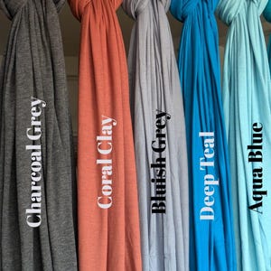 Jersey hijab for women, Muslim headscarf, soft stretchy hijab for daily wear

Plain jersey hijab, breathable modest head wrap, perfect for work or prayer

Non-slip stretch jersey hijab, easy to style Muslim head covering

Everyday jersey hijab, comfortable and elegant modest fashion accessory