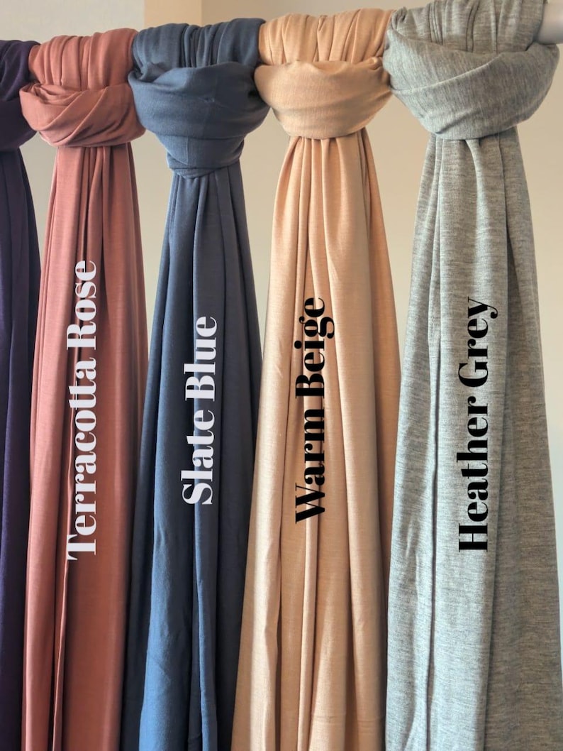 Jersey hijab for women, Muslim headscarf, soft stretchy hijab for daily wear

Plain jersey hijab, breathable modest head wrap, perfect for work or prayer

Non-slip stretch jersey hijab, easy to style Muslim head covering

Everyday jersey hijab, comfortable and elegant modest fashion accessory