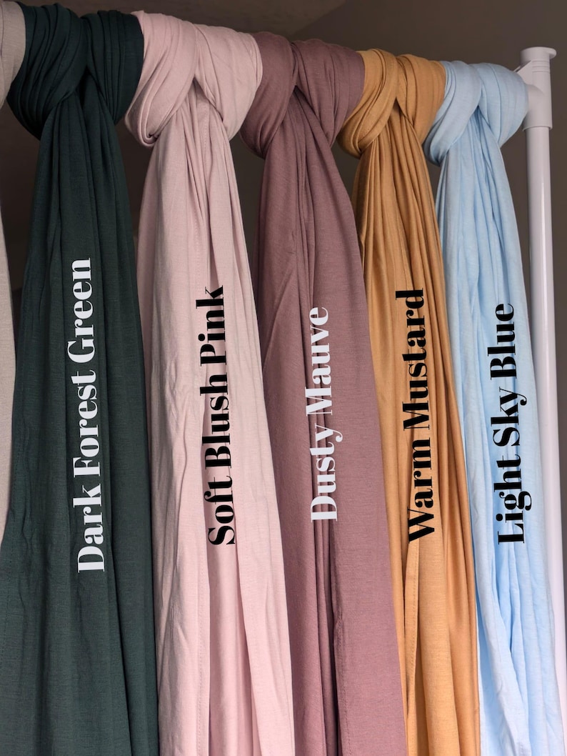 Jersey hijab for women, Muslim headscarf, soft stretchy hijab for daily wear

Plain jersey hijab, breathable modest head wrap, perfect for work or prayer

Non-slip stretch jersey hijab, easy to style Muslim head covering

Everyday jersey hijab, comfortable and elegant modest fashion accessory